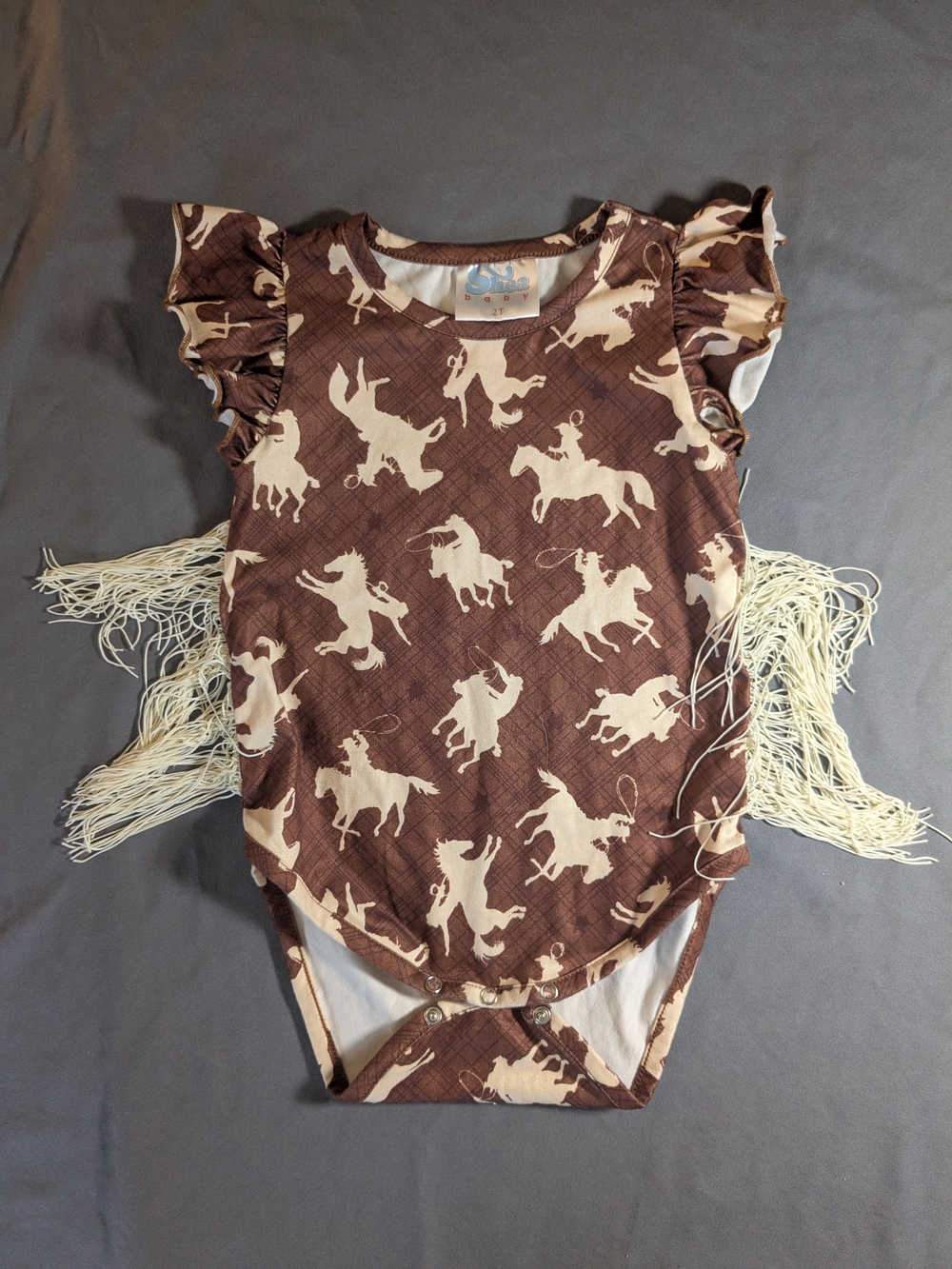 Cowboy Print Flutter Sleeve One-Piece Bodysuit in Brown and Cream 2T